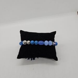 blue beaded stretch bracelet with tassel